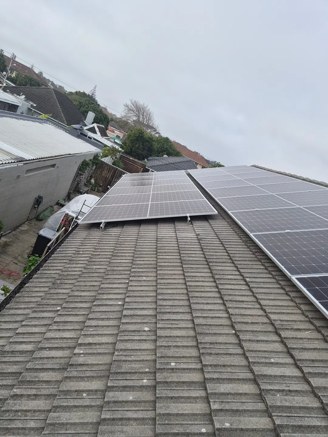 Two solar arrays on neighbouring roof planes